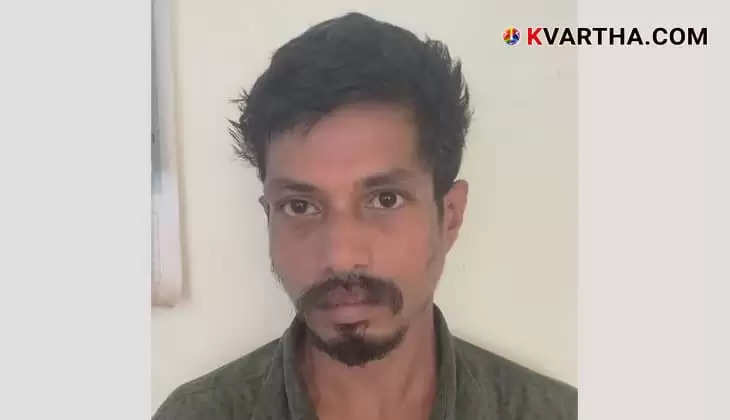 Man being arrested for stealing a mobile phone in Kannur