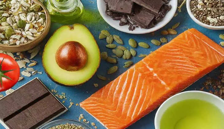 A plate of healthy food including fruits, vegetables, and nuts