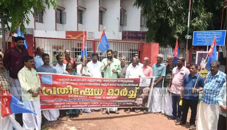 Pravasi Federation members participating in a protest against airfare hike.